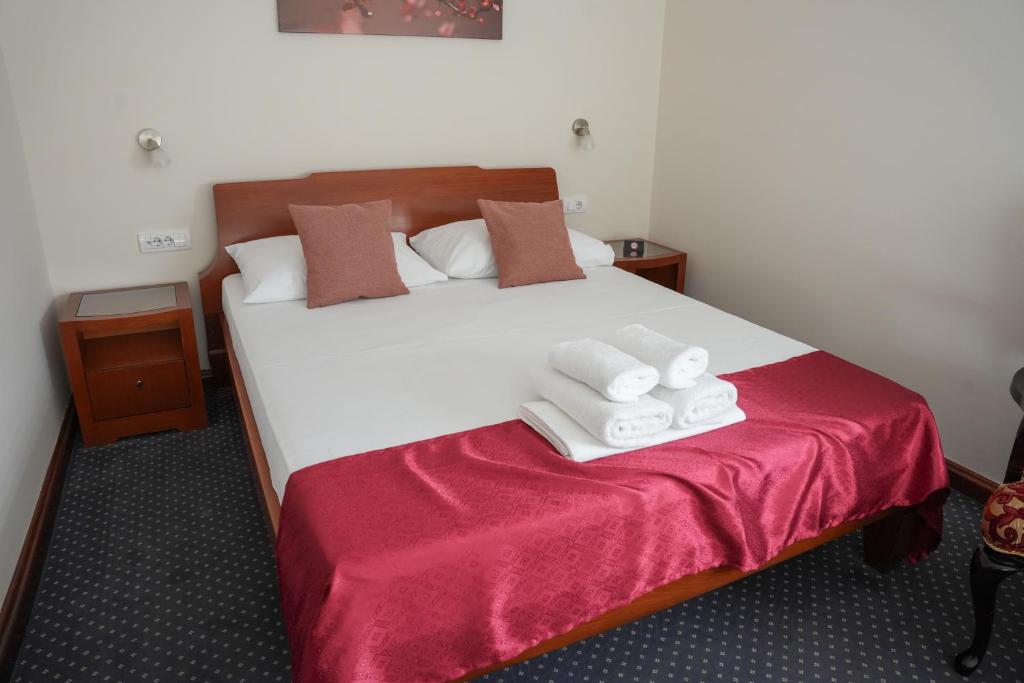 Postel nebo postele na pokoji v ubytování Comfort Lodge