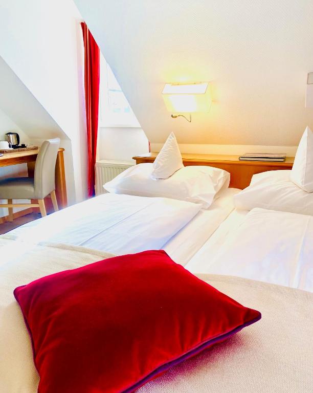 Postel nebo postele na pokoji v ubytování Hotel Fischerhaus