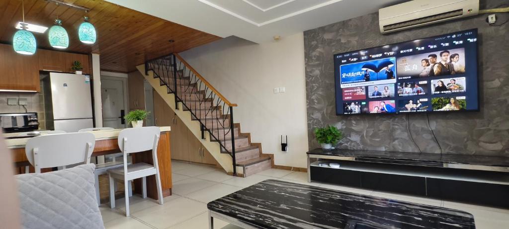 Kuchyň nebo kuchyňský kout v ubytování Chaoyang Joy City Hardcover Apartment