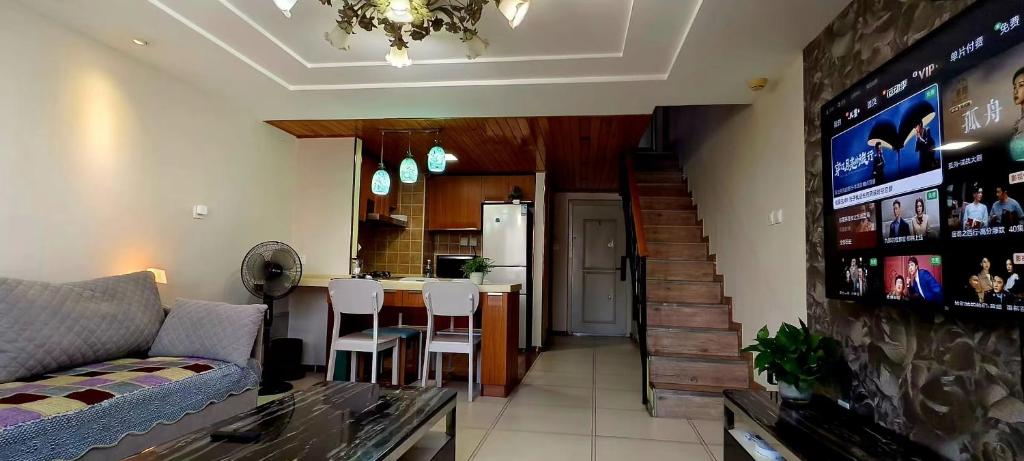 Kuchyň nebo kuchyňský kout v ubytování Chaoyang Joy City Hardcover Apartment
