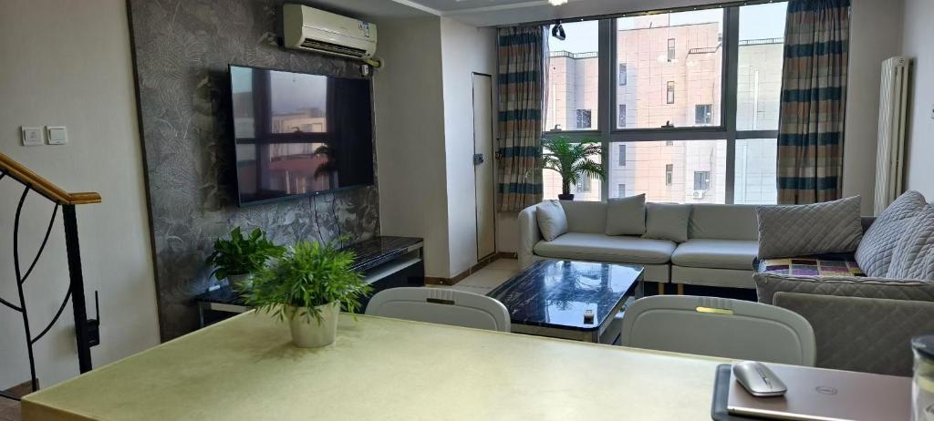 Posezení v ubytování Chaoyang Joy City Hardcover Apartment
