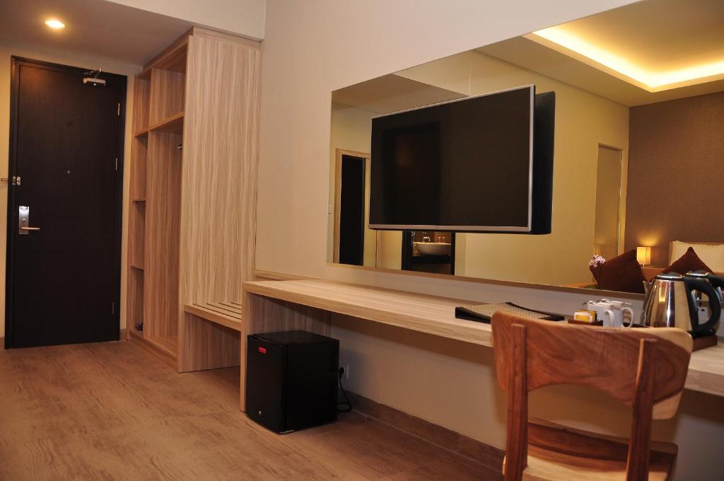 TV a/nebo společenská místnost v ubytování The Evitel Resort Ubud