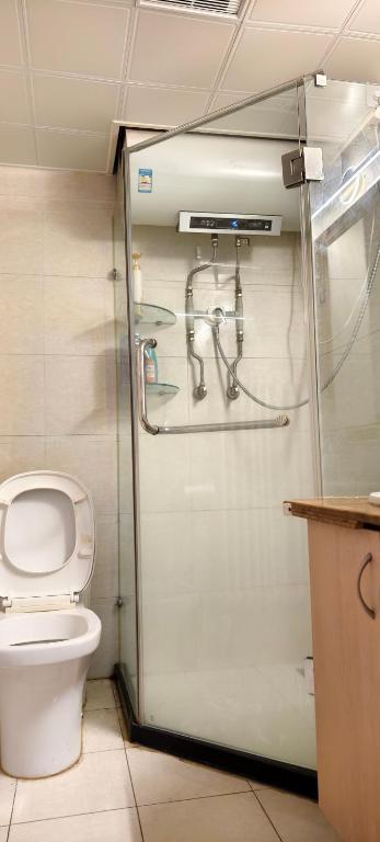 Koupelna v ubytování Chaoyang Joy City Hardcover Apartment