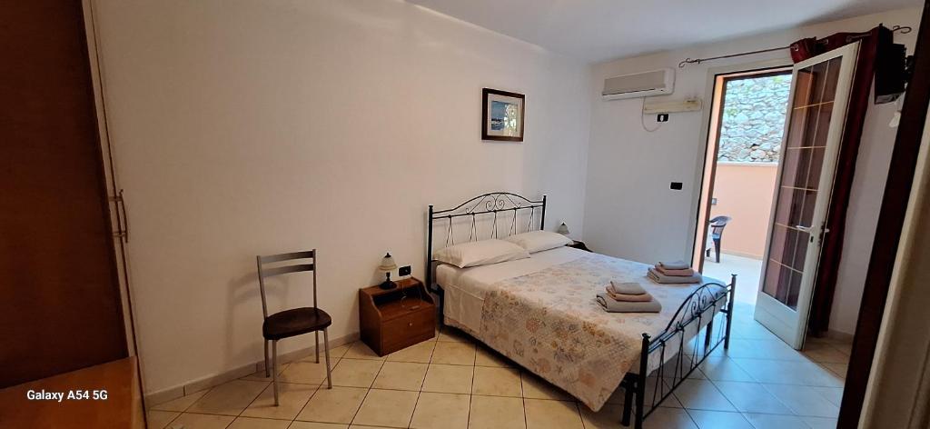 A bed or beds in a room at Maxpensione