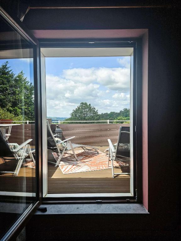 Balkón nebo terasa v ubytování Vue sur les collines