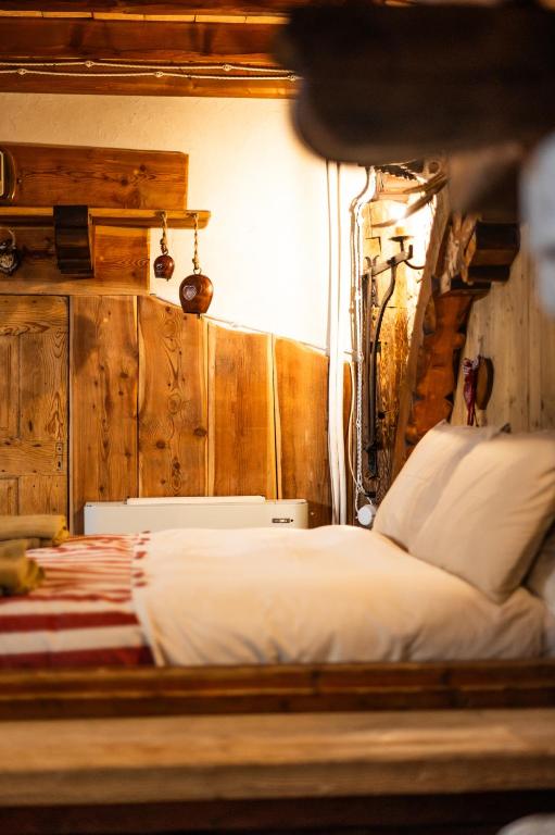 Postel nebo postele na pokoji v ubytování Alfio's Alpen Suite