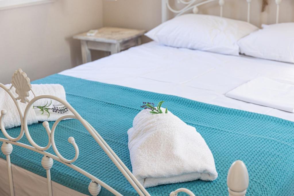 Postel nebo postele na pokoji v ubytování Pappous Adreas