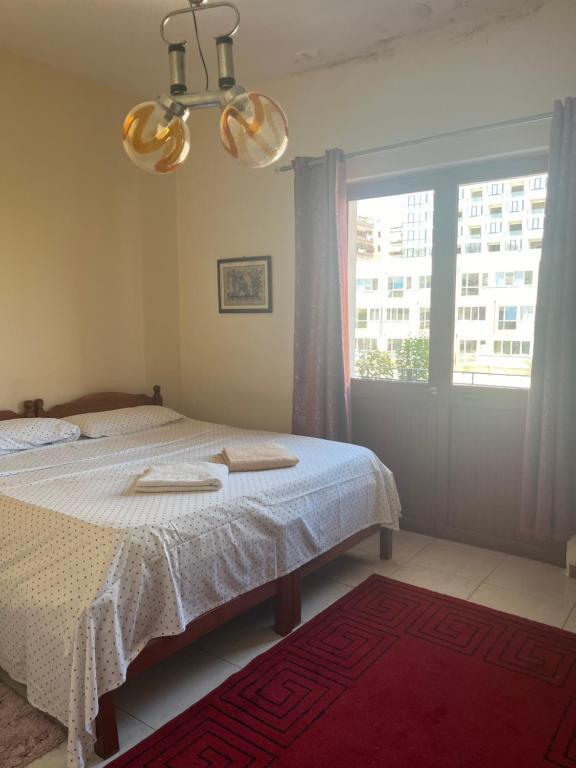 Postel nebo postele na pokoji v ubytování Hotel Luli City Center