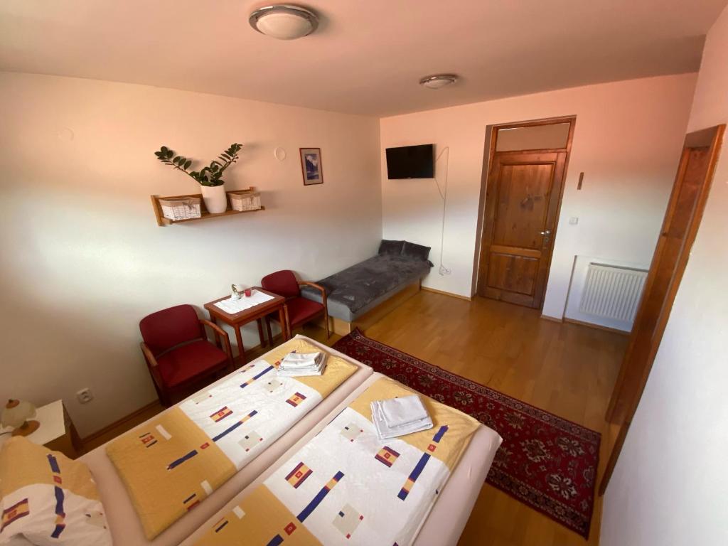 A television and/or entertainment centre at Privát Viktória Terchová