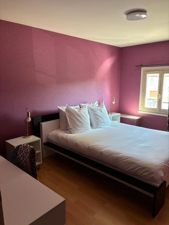 Postel nebo postele na pokoji v ubytování Logis Hotel restaurant de la Poste