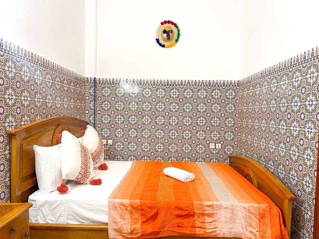 Postel nebo postele na pokoji v ubytování Dar Chefchaouen - Jebha Room