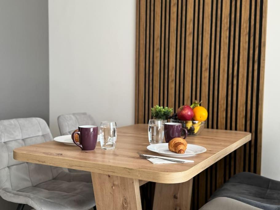 Posezení v ubytování Modern 1BR Apartment with free Parking and free Gym Pass