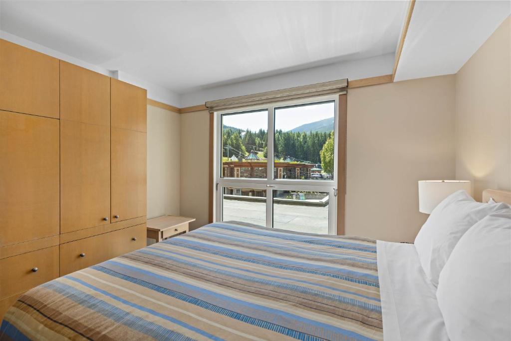 Postel nebo postele na pokoji v ubytování Le Chamois by Whistler Premier