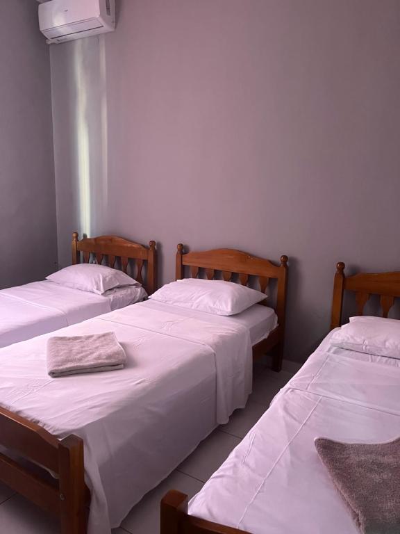 Postel nebo postele na pokoji v ubytování Hotel Luli City Center