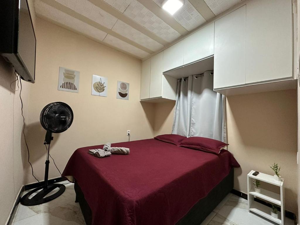 Ένα ή περισσότερα κρεβάτια σε δωμάτιο στο Chalé Bella Serra