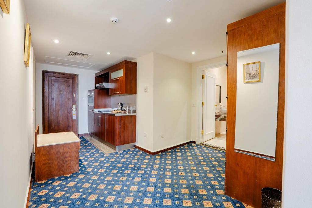 Kuchyň nebo kuchyňský kout v ubytování Om Kolthoom Hotel