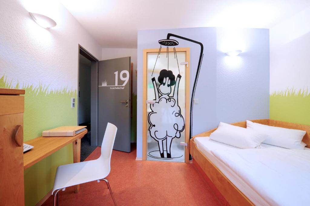 Postel nebo postele na pokoji v ubytování krenzers rhön