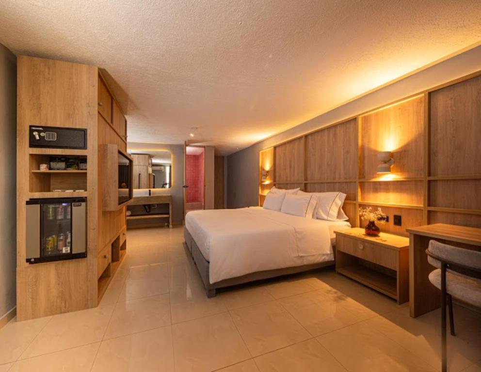 Postel nebo postele na pokoji v ubytování Mood Matuna Hotel Cartagena
