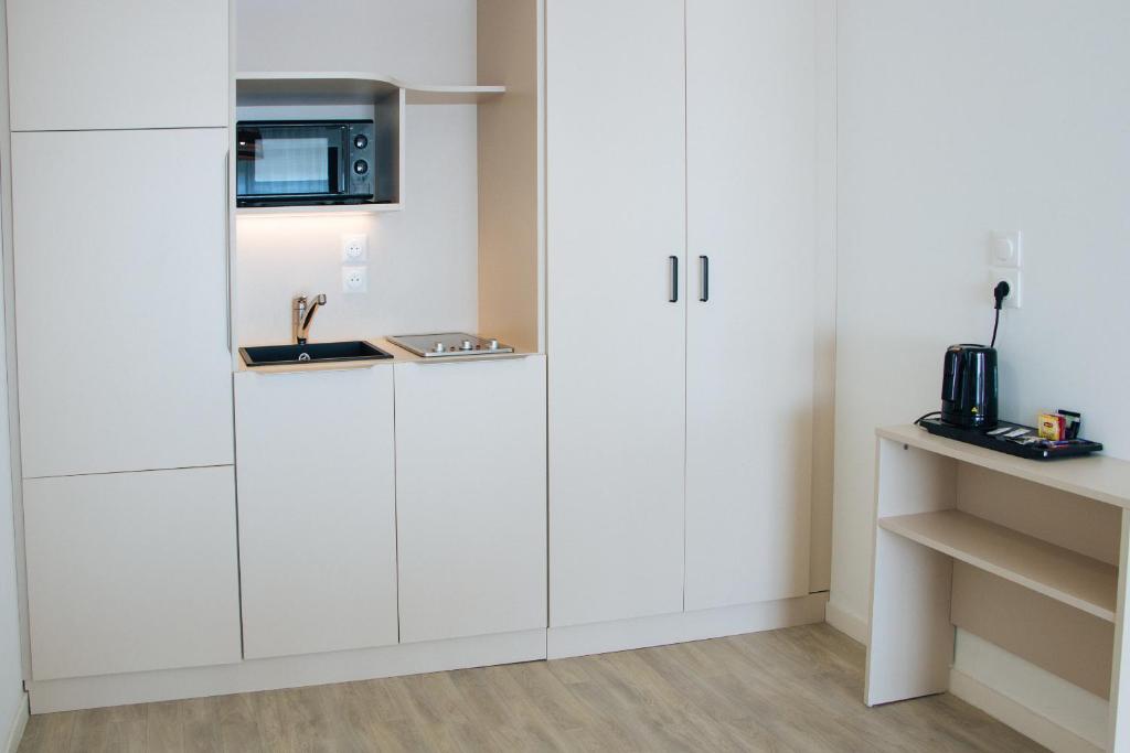 Kuchyňa alebo kuchynka v ubytovaní Twenty Business Flats Lille - Bayard