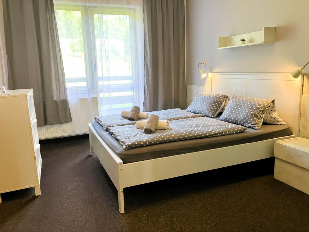 Postel nebo postele na pokoji v ubytování Star Hotels Benecko