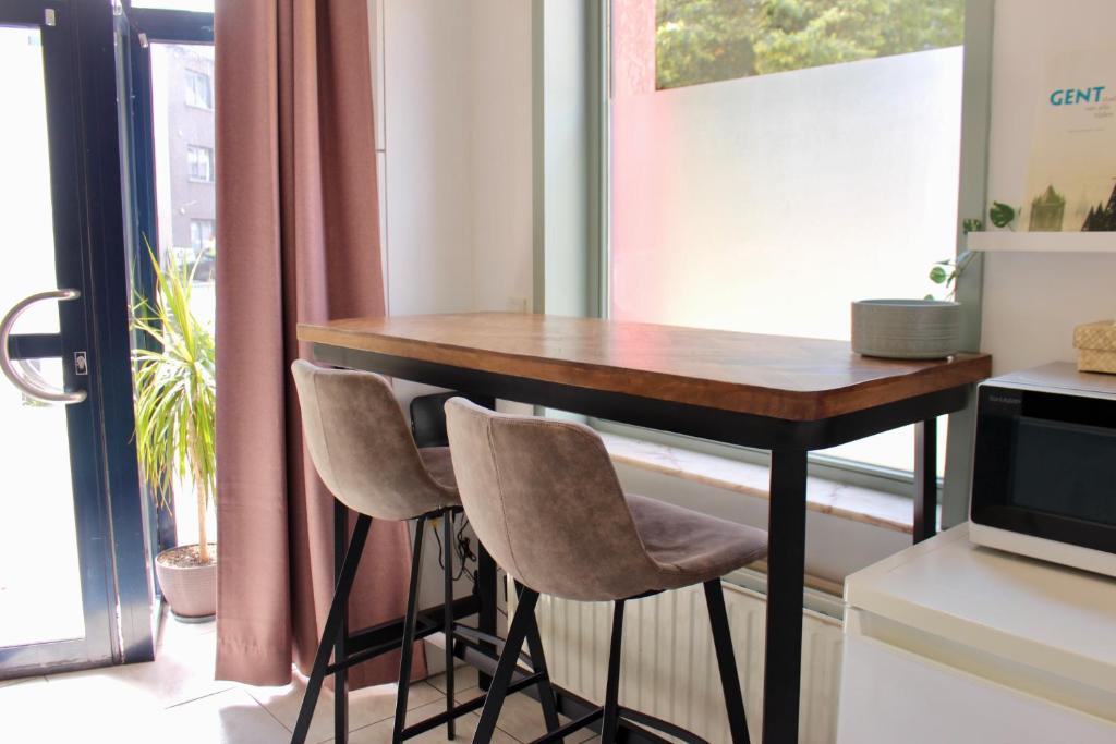 Kuchyň nebo kuchyňský kout v ubytování Cozy private suite