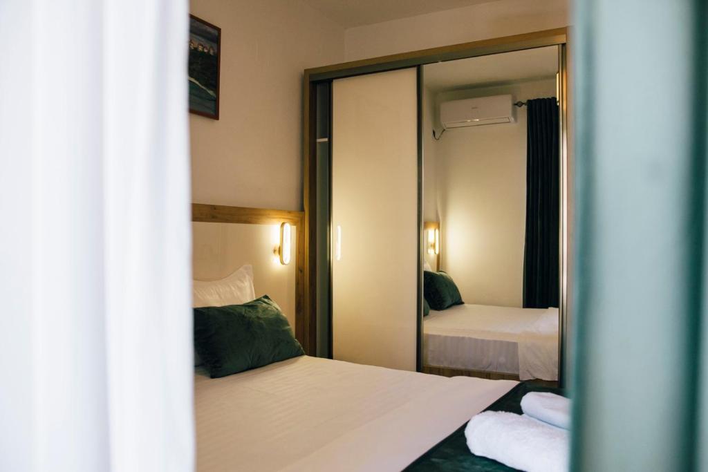 Postel nebo postele na pokoji v ubytování Premium apartments