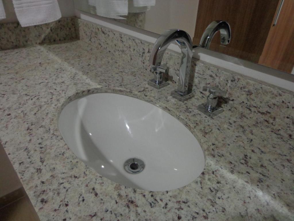 Koupelna v ubytování Foz Presidente Comfort Hotel