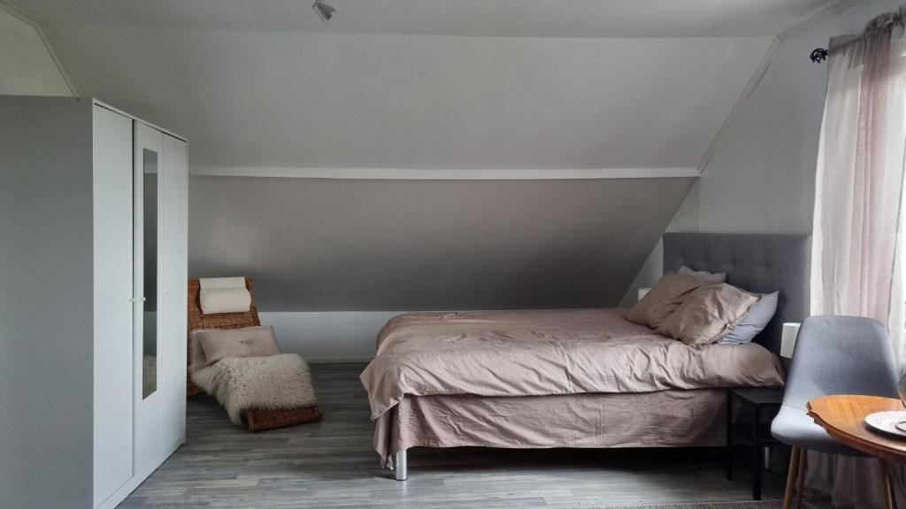 Postel nebo postele na pokoji v ubytování Favorita