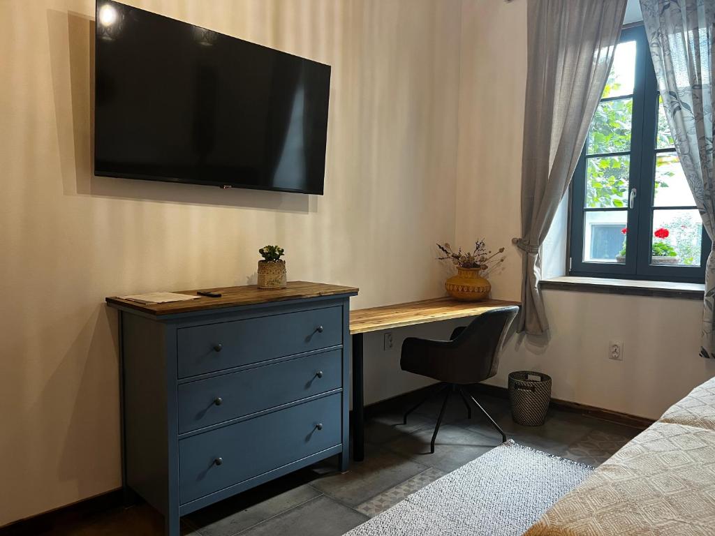 TV a/nebo společenská místnost v ubytování Zöldkapu Vendégház
