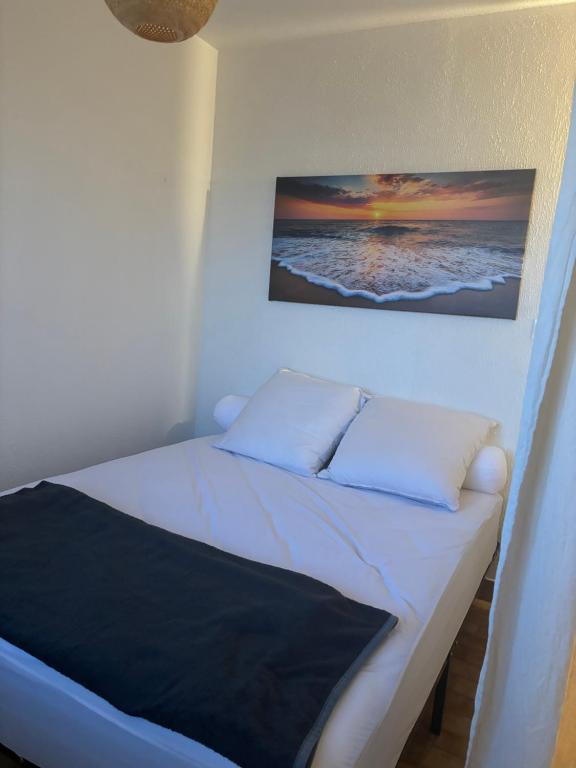 Postel nebo postele na pokoji v ubytování Appartement T2 Frontignan Plage - 100m de la mer