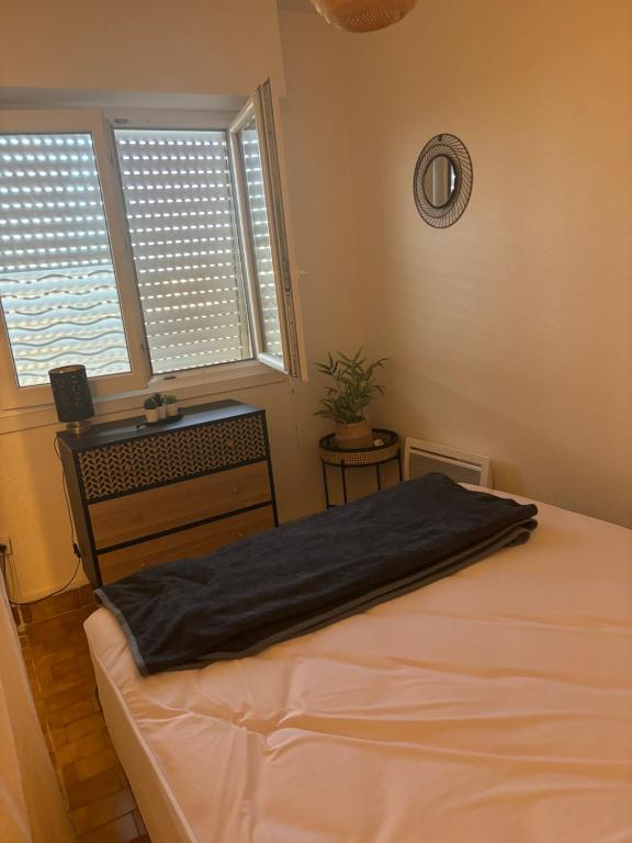Postel nebo postele na pokoji v ubytování Appartement T2 Frontignan Plage - 100m de la mer