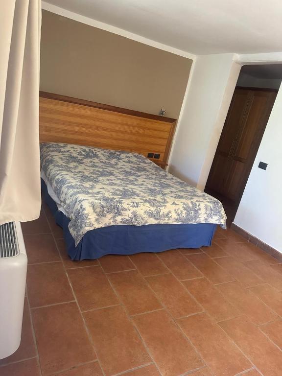 Postel nebo postele na pokoji v ubytování Hotel Tenuta dell'Argento Resort
