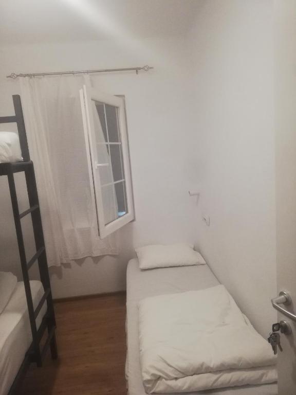 Postel nebo postele na pokoji v ubytování Hostel Vintage