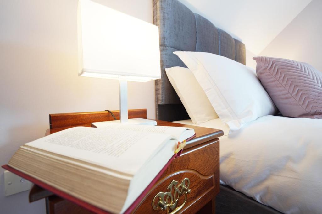 Postel nebo postele na pokoji v ubytování Ashville Guesthouse
