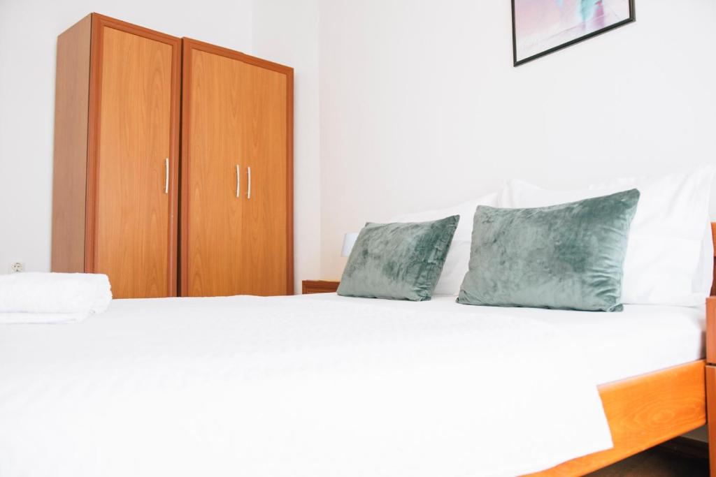 Postel nebo postele na pokoji v ubytování Premium apartments