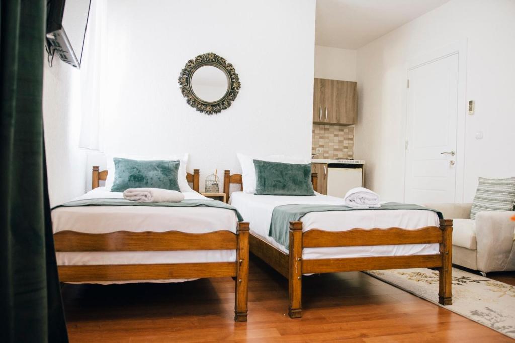 Postel nebo postele na pokoji v ubytování Premium apartments
