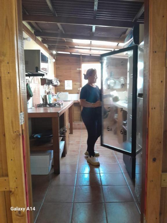 Kuchyň nebo kuchyňský kout v ubytování Hostal Hansi