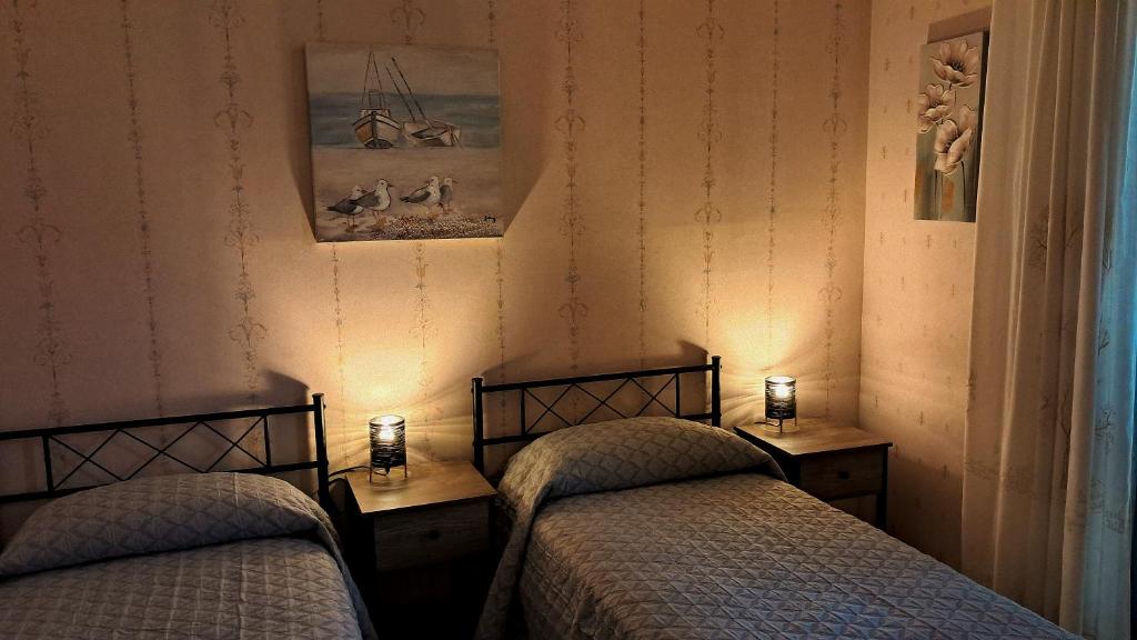 Postel nebo postele na pokoji v ubytování Casa 'A Vanedda'