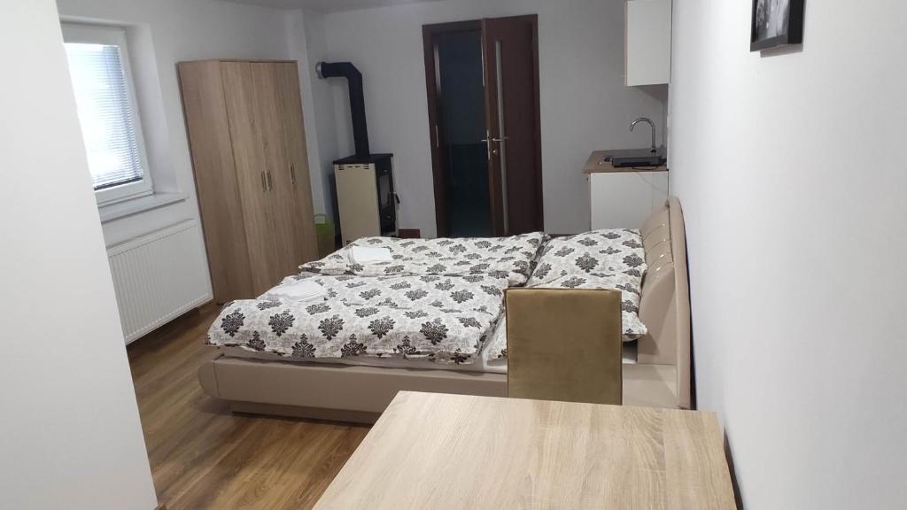 Postel nebo postele na pokoji v ubytování Apartmany Tatra Relax, Velky Slavkov