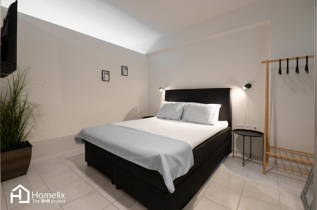 Postel nebo postele na pokoji v ubytování Agora Central Home