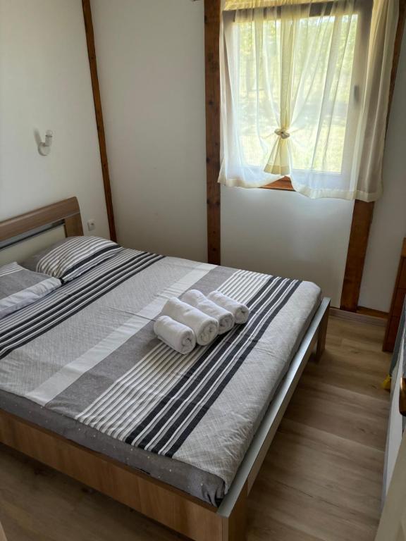 Postel nebo postele na pokoji v ubytování Kuća Tajna Banja Vrujci