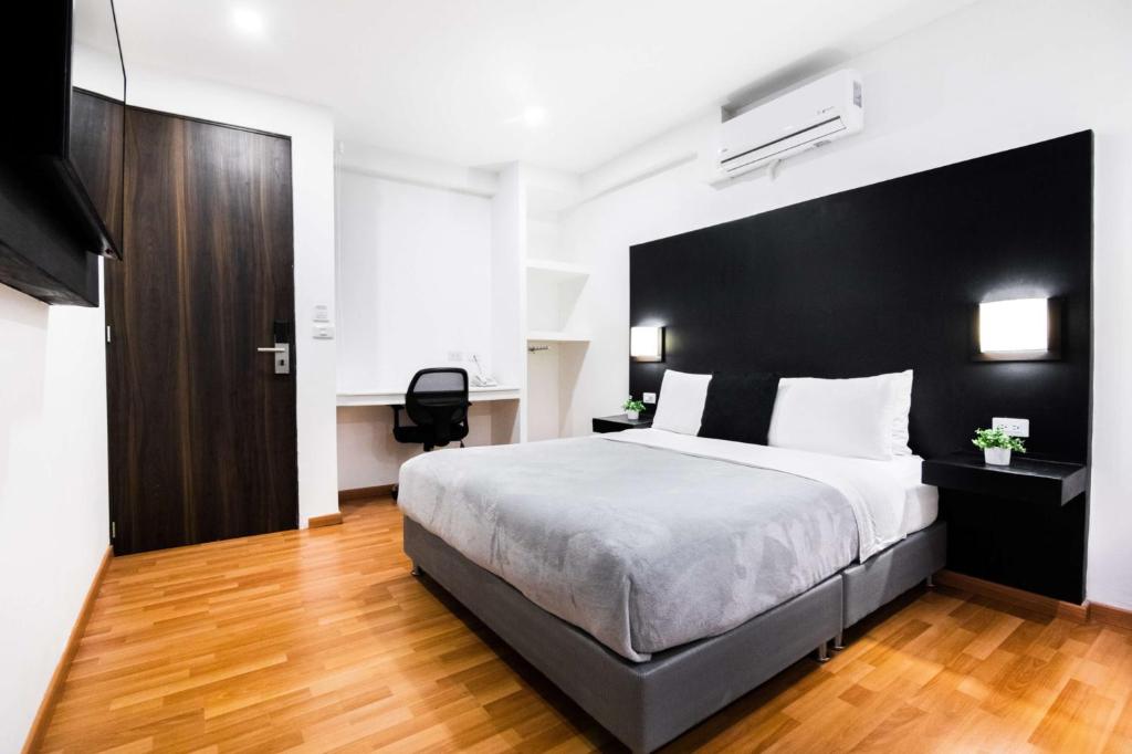 Postel nebo postele na pokoji v ubytování Hotel Z3 Pereira