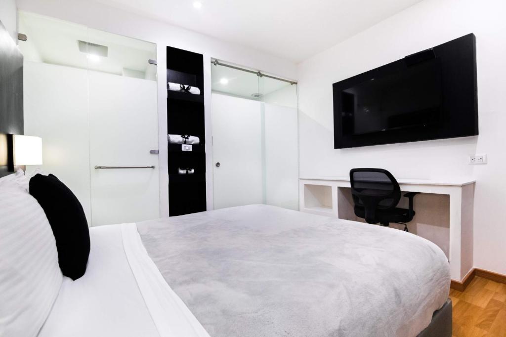 TV a/nebo společenská místnost v ubytování Hotel Z3 Pereira
