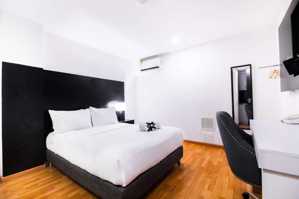Postel nebo postele na pokoji v ubytování Hotel Z3 Pereira