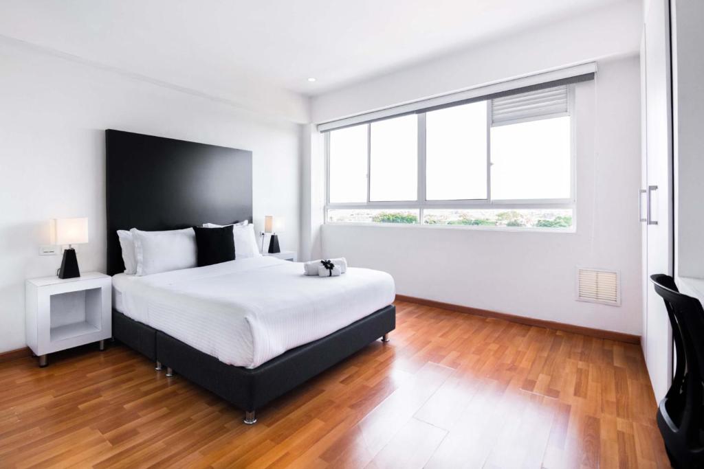 Postel nebo postele na pokoji v ubytování Hotel Z3 Pereira