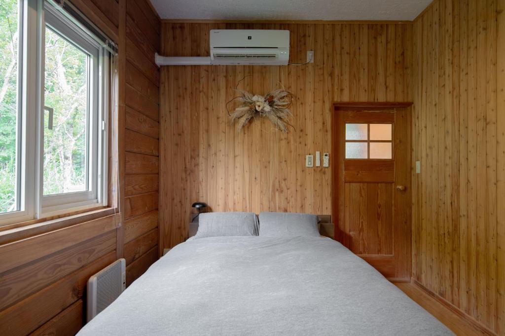 Postel nebo postele na pokoji v ubytování Yap Shack