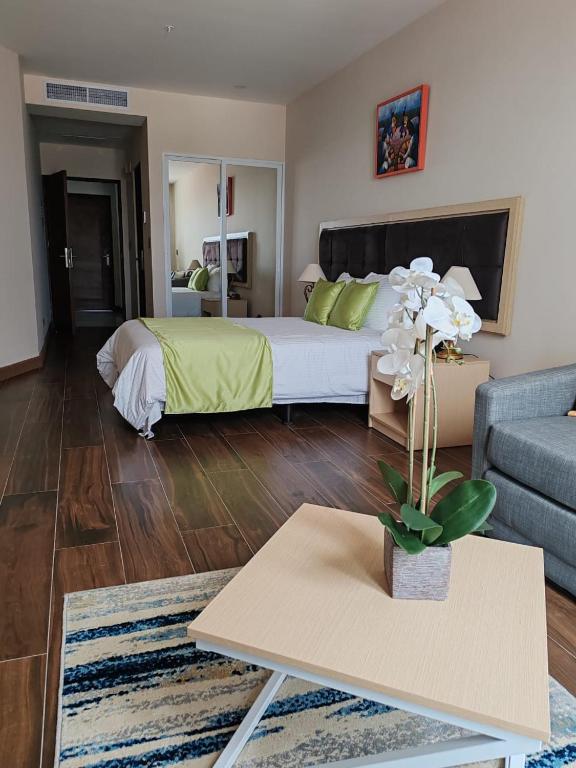 Postel nebo postele na pokoji v ubytování Hotel Puerto Limón CR