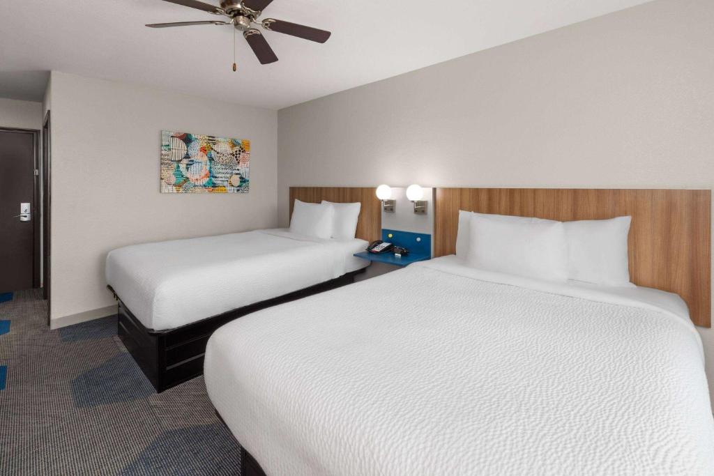 Postel nebo postele na pokoji v ubytování Microtel Inn & Suites by Wyndham Buda Austin South
