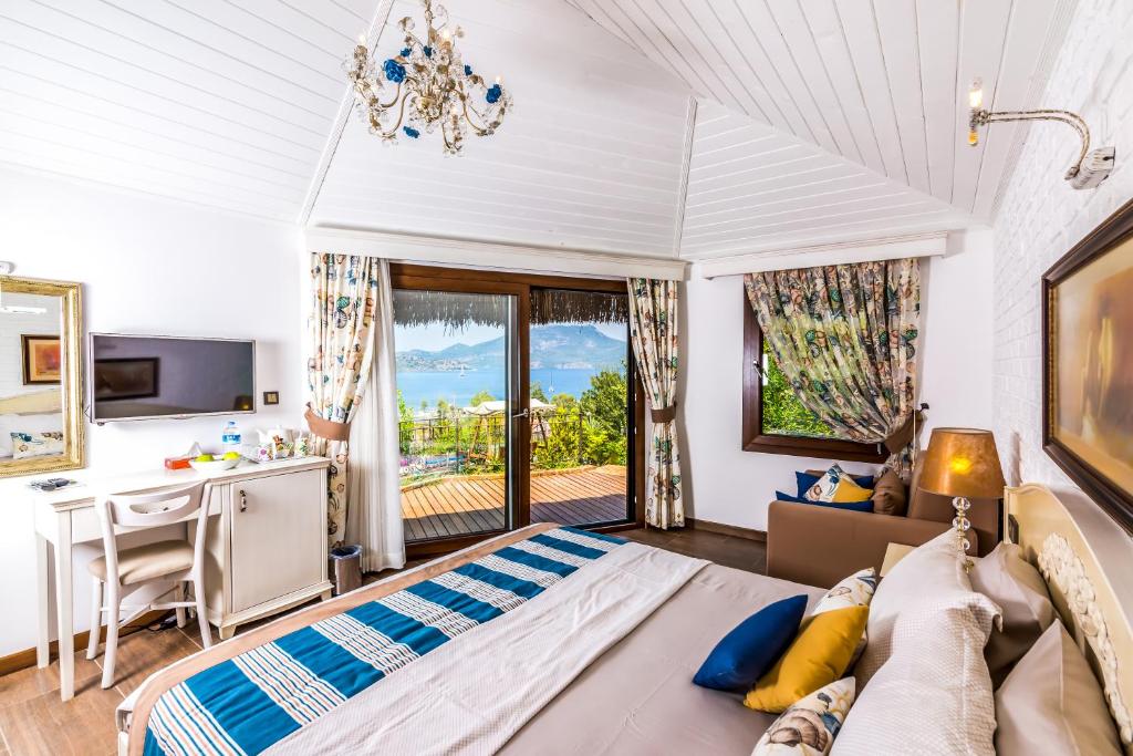 TV in/ali zabaviščno središče v nastanitvi Badem Tatil Evi