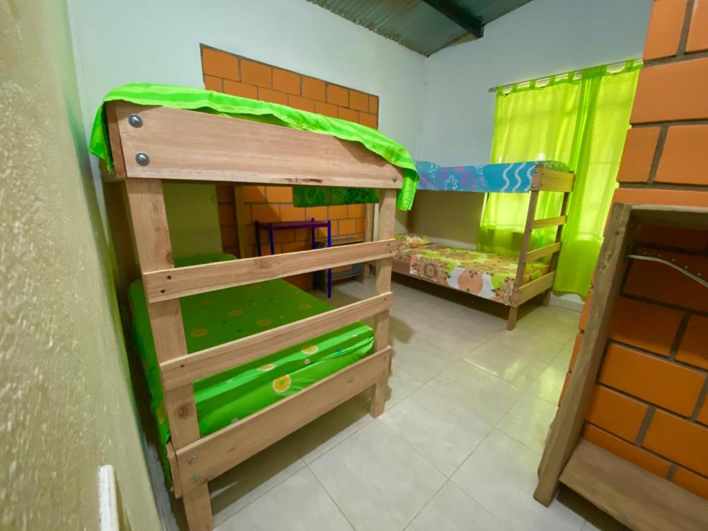 Postel nebo postele na pokoji v ubytování Hostal Luna Llena